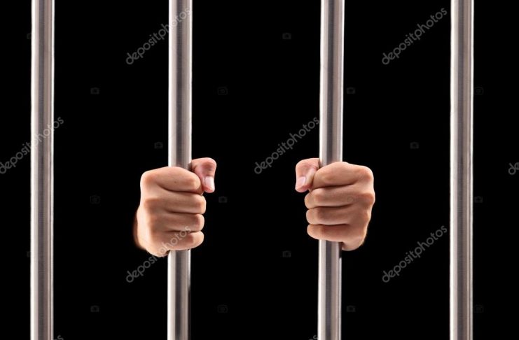 depositphotos_45888849-stock-photo-male-hands-holding-prison-bars
