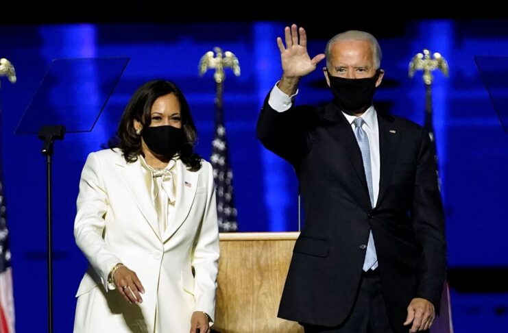 Democratic vice-presidential nominee Kamala Harris and Democratic 2020 U.S. presidential nominee Joe Biden greet supporters at an election rally, after news media announced that Biden has won the 2020 U.S. presidential election, in Wilmington, Delaware, U.S., November 7, 2020. Andrew Harnik/Pool via REUTERS