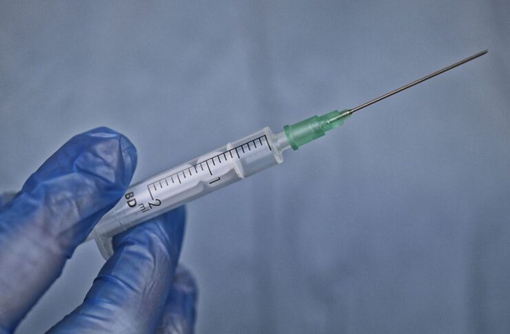 Vacina, vacinação,seringa, covid 19