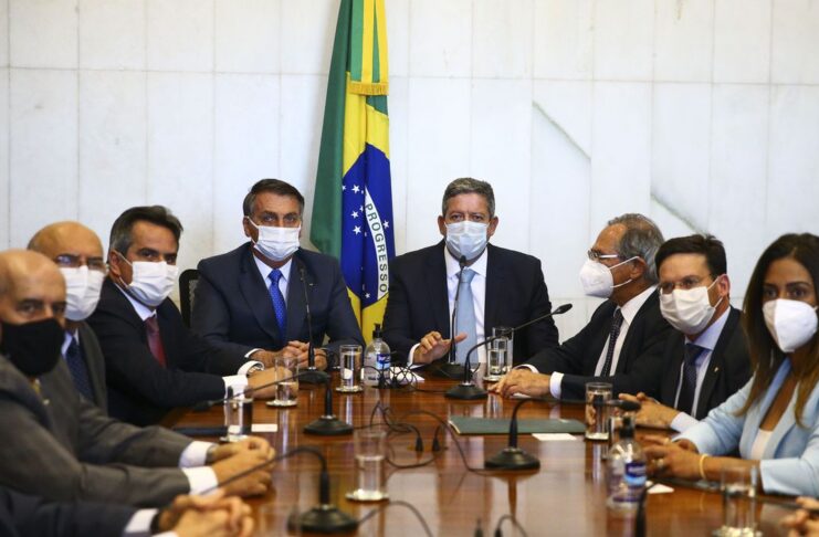 O presidente Jair Bolsonaro durante reunião para entrega da medida provisória do novo Bolsa Família ao presidente da Câmara, Arthur Lira. O programa se chamará Auxílio Brasil.