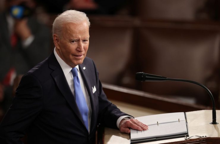 U.S. President Joe Biden delivers his first address to a socially distant joint session of the U.S. Congress inside the House Chamber of the U.S. Capitol in Washington, U.S., April 28, 2021. REUTERS/Jonathan Ernst/Pool