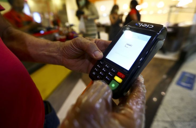 Pagamento em cartão.
(Foto: Marcelo Camargo)